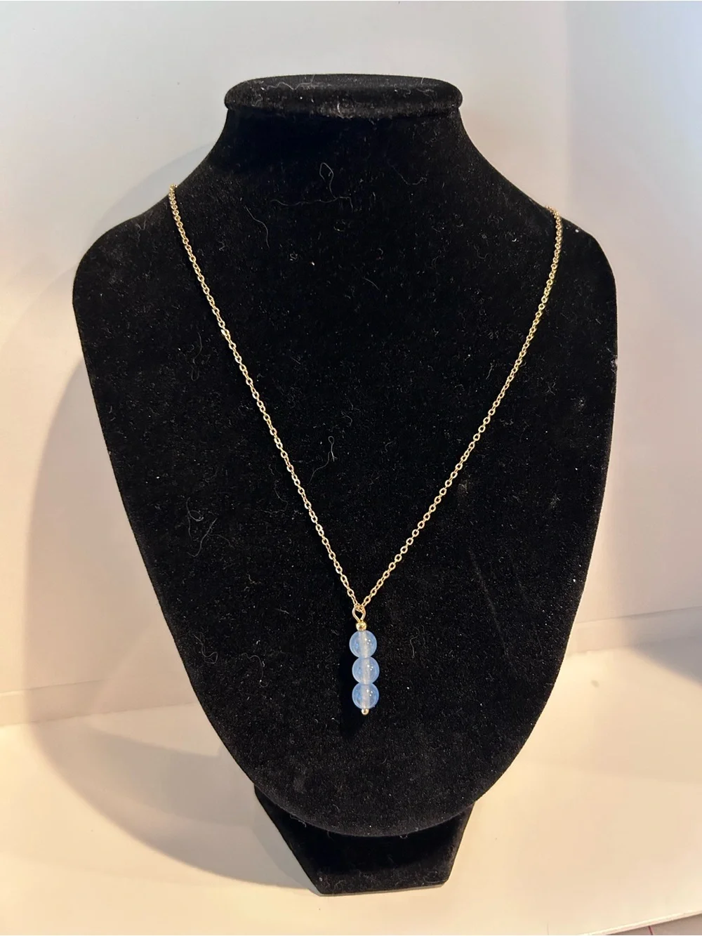 Gold Chain Necklace with Light Blue Bead Trio Pendant